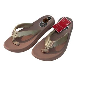 Nike Women’s rose gold Bella Kai thong flip flop